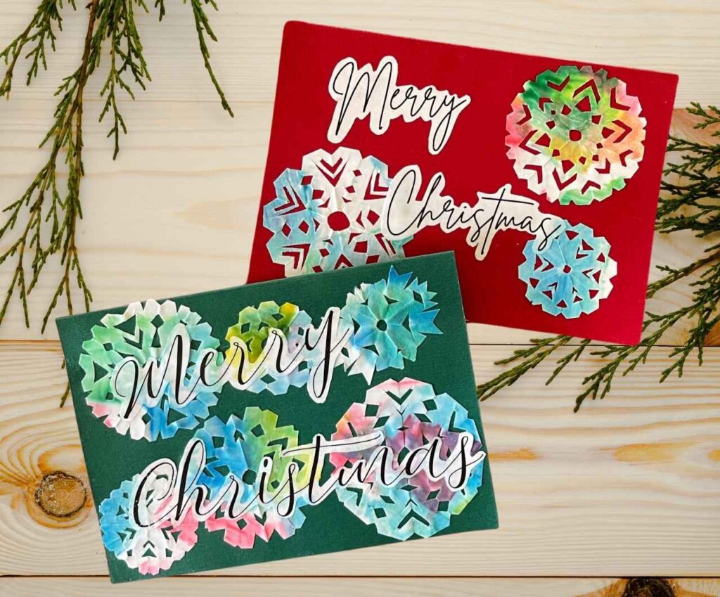 DIY Christmas cards sitting on wood