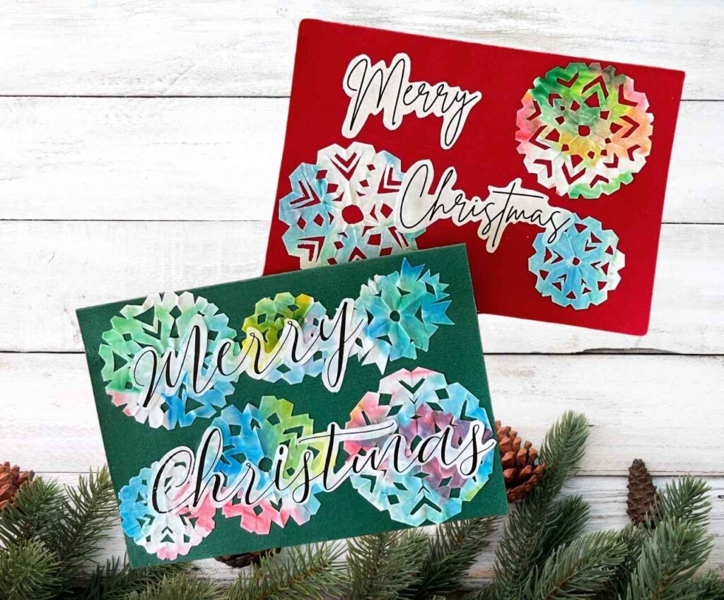 DIY Christmas cards sitting on wood
