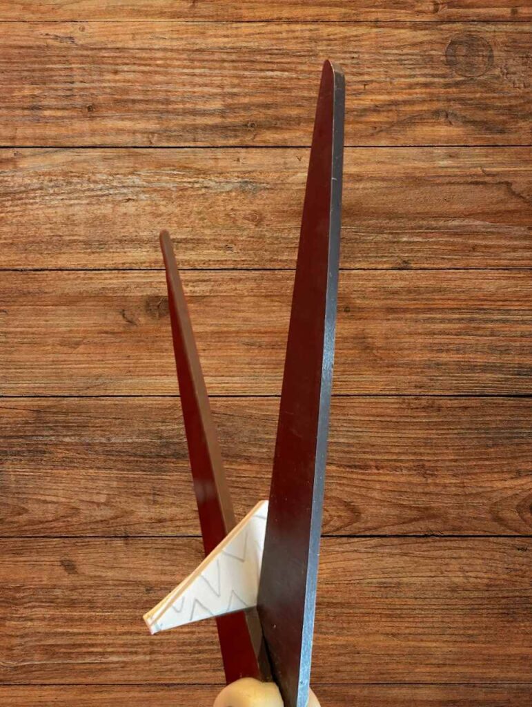 cutting out snowflake